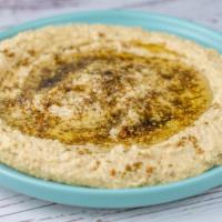 Hummus (Cold Mezzes) · Classic blend of chickpeas, tahini, garlic & olive oil