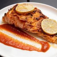 Harissa Salmon · Serving size is 1/2 lb.