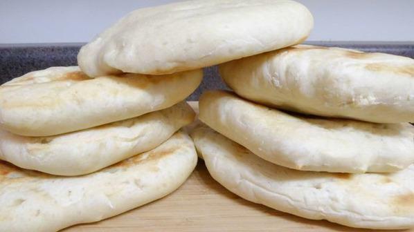 Pita Bread · Three pieces of our fresh baked pita bread.