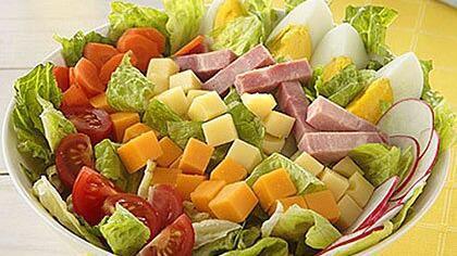 Chef'S Salad · Lettuce, tomatoes, turkey, roast beef, american cheese and swiss cheese.