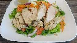 Crispy Chicken Salad · Lettuce, tomatoes, one piece chicken cutlet, cucumber and ranch dressing.