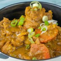 Curry Chicken · Served with rice and peas or white rice
-cabbage
call add other sides