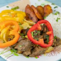 Curry Goat · Served with rice and peas or white rice
-cabbage
call add other sides