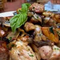 Chicken Scarpariello · Oven roasted, sausage, finished with white wine,
mushrooms, sage and springs rosemary sause,...