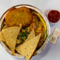Vegetable Omelette · Tomato onions peppers mushroom and broccoli.