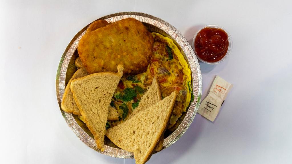 Vegetable Omelette · Tomato onions peppers mushroom and broccoli.