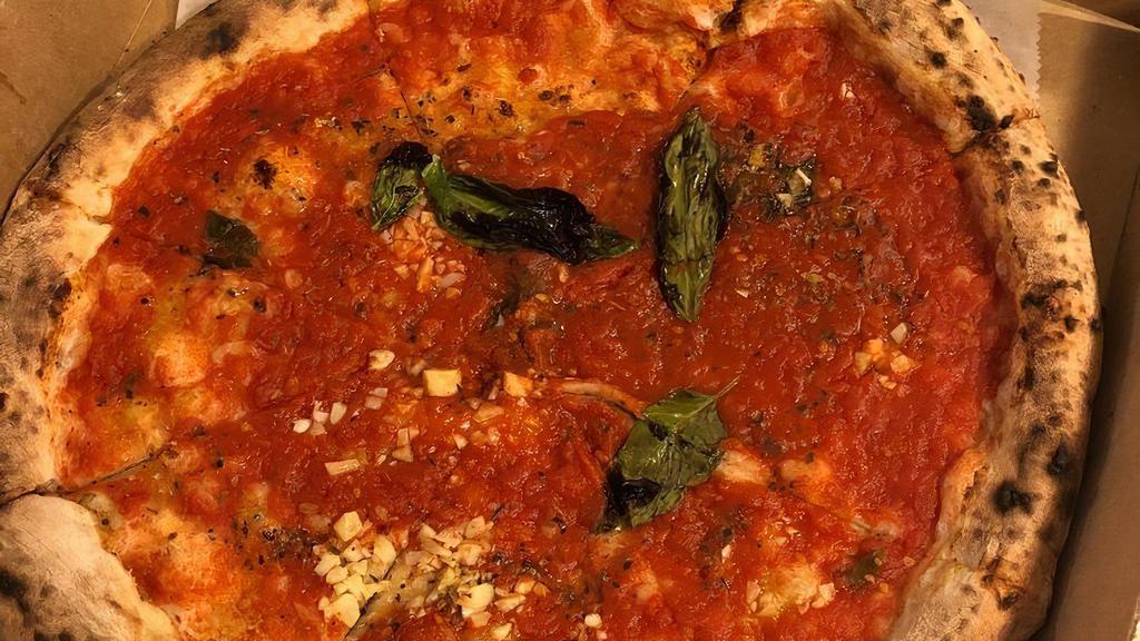Pizza Vela · Fresh mozzarella, fried zucchini, ricotta and cherry tomatoes.