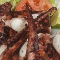 Pulpo A La Brasa · Grilled octopus.
