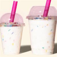 Regular B'Day Cake Shake · A sweet, sippable treat blending Cereal Milk™ Soft Serve with B’Day Cake Truffles.