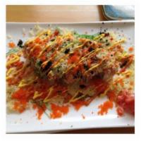 Niji Special Roll · Crabmeat salad inside with tuna, salmon, crunchy, green seaweed & tobiko outside.