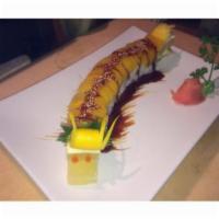 Dragon Roll · Eel & cucumber roll with avocado & tobiko outside.