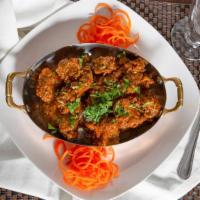 Lamb Curry · Small pieces of lamb in medium spiced curry sauce.  Spicy.

This facility uses dairy, eggs, ...