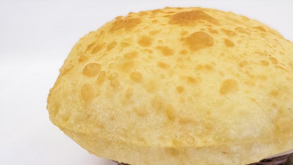 Masala Kulcha · Soft white flour bread stuffed with seasoned cottage cheese.