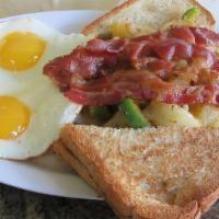 Breakfast Special · Eggs with choice of breakfast meat with a side of toast.
