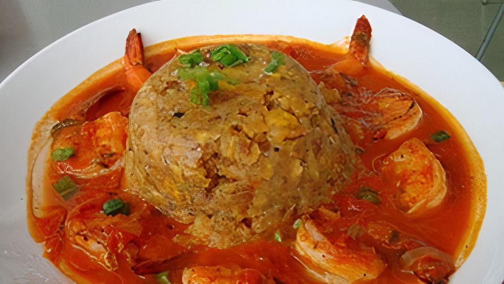 Camarofongo · Shrimp with deep-fried green plantains mashed together.
