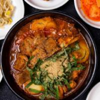 Pork Backbone Soup (감자탕) · Spicy pork backbone stew with potatoes.

* Includes rice and various side dishes.
