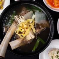 Galbi Soup (왕갈비탕) · Beef short rib soup. * Includes rice and various side dishes.