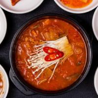 Dumok Kimchi Stew (김치찌개) · Dumok Kimchi Stew is made in house specifically for this stew.

* Includes rice and various ...