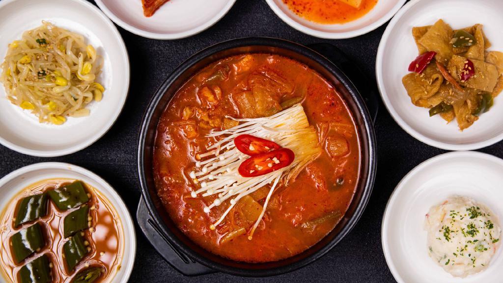 Dumok Kimchi Stew (김치찌개) · Dumok Kimchi Stew is made in house specifically for this stew.

* Includes rice and various side dishes.