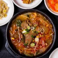 Napa Cabbage Hangover Soup (우거지해장국) · Spicy soup with beef and Napa cabbage made from beef broth.

* Includes rice and various sid...