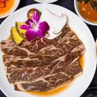 Marinated Beef Short Rib - 2 Servings (La갈비 2인분) · Served with Korean soybean stew. * All meats are fully cooked on a special Korean cast iron ...