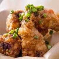 Mighty Wings (5 Pieces) · Our signature double fried chicken wings in sweet and savory sauce topped with scallions and...