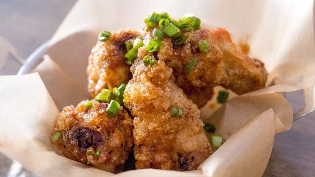 Mighty Wings (5 Pieces) · Our signature double fried chicken wings in sweet and savory sauce topped with scallions and sesame seeds.