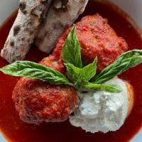 Meatballs · Two 100% beef meatballs in red sauce with basil, parmesan, ricotta, and served with fresh br...