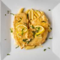 Chicken Francese · Chicken breast with egg, lemon, white wine, and butter sauce. Served with your choice of pas...