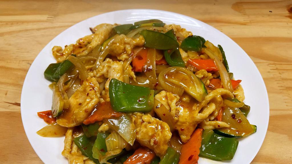 Spicy Curry Chicken · Hot & spicy. Sliced chicken stir fried with red peppers, green peppers and onions in a spicy panang curry sauce.