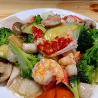 Seafood Delight · A combination of lobster meat, fresh scallops and jumbo shrimp sauteed with a mixture of gar...