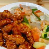 Dragon & Phoenix · Hot. General tso's chicken in its distinctive sweet spicy sauce and mixture of shrimp and Ch...