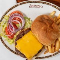 Burger · Fresh 100z char broiled burger served with French fries, lettuce, tomato, onion, coleslaw an...