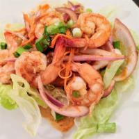 Shrimp Salad · Mild. Grilled shrimp tossed with red onions, scallions, tomatoes, carrots and cucumbers in a...