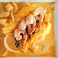Mango Curry Shrimp · Jumbo shrimp with onions, potatoes, spinach, and mango topped with yellow curry sauce (made ...