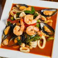Phayathai Seafood · Spicy. Sautéed shrimp, calamari, scallops, mussels, onions, scallions and bell peppers with ...