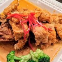 Panang Fish · Spicy. Deep-fried whole striped bass topped with Thai Panang curry mixed with coconut milk a...