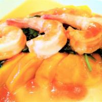 Mango Shrimp · Jumbo shrimp sautéed with ripe mango in a homemade sweet and sour sauce.