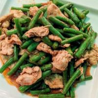 String Bean Sauce · Spicy. Sautéed with chili paste, lime leaves, bell peppers, and string beans.
