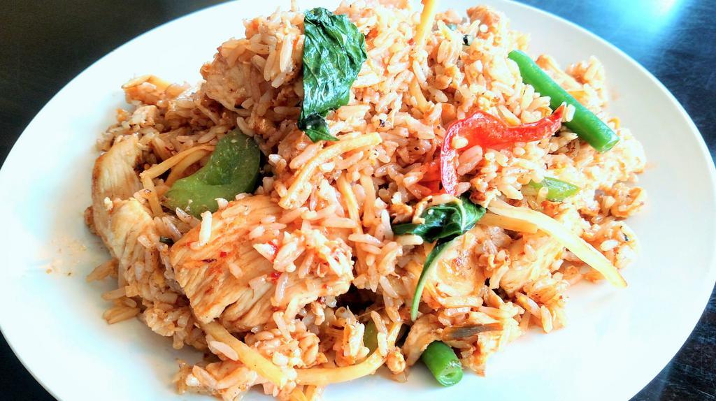 Basil Fried Rice · Mild. Fried rice with eggs, basil, bamboo shoots, tomatoes, onions, and bell peppers.