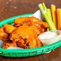 Buffalo Chicken Wings · Six w/ Blue Cheese Dressing + Celery + Carrots