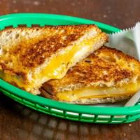 Grilled Cheese · Cheddar + Fontina + Buttered Sourdough