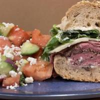 Roast Beef · Served with lettuce, tomatoes, onions, oil and vinegar, mayonnaise, and mustard.