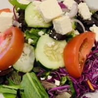 Greek Salad · Mixed carrots, cucumbers, olives, red onions, tomatoes, and feta cheese.