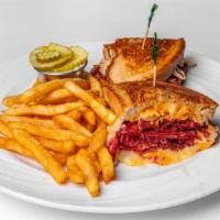 Corned Beef Reuben · corned beef, kraut, Russian dressing, swiss, grilled rye.