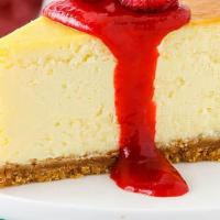 Cheese Cake · New York style cheese cake with strawberry sauce