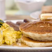 Pancakes With Scrambled Eggs · Three buttermilk pancakes served with two scrambled eggs, butter and maple syrup.