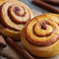 Cinnamon Rolls · Freshly rolled cinnamon rolls.