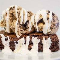 Brownie Sundae · One scoop and one topping with whipped cream.