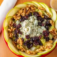 The Famous Apple Salad · Romaine heart lettuce, sliced apples, dried cranberries, Bleu cheese crumbles, walnuts with ...